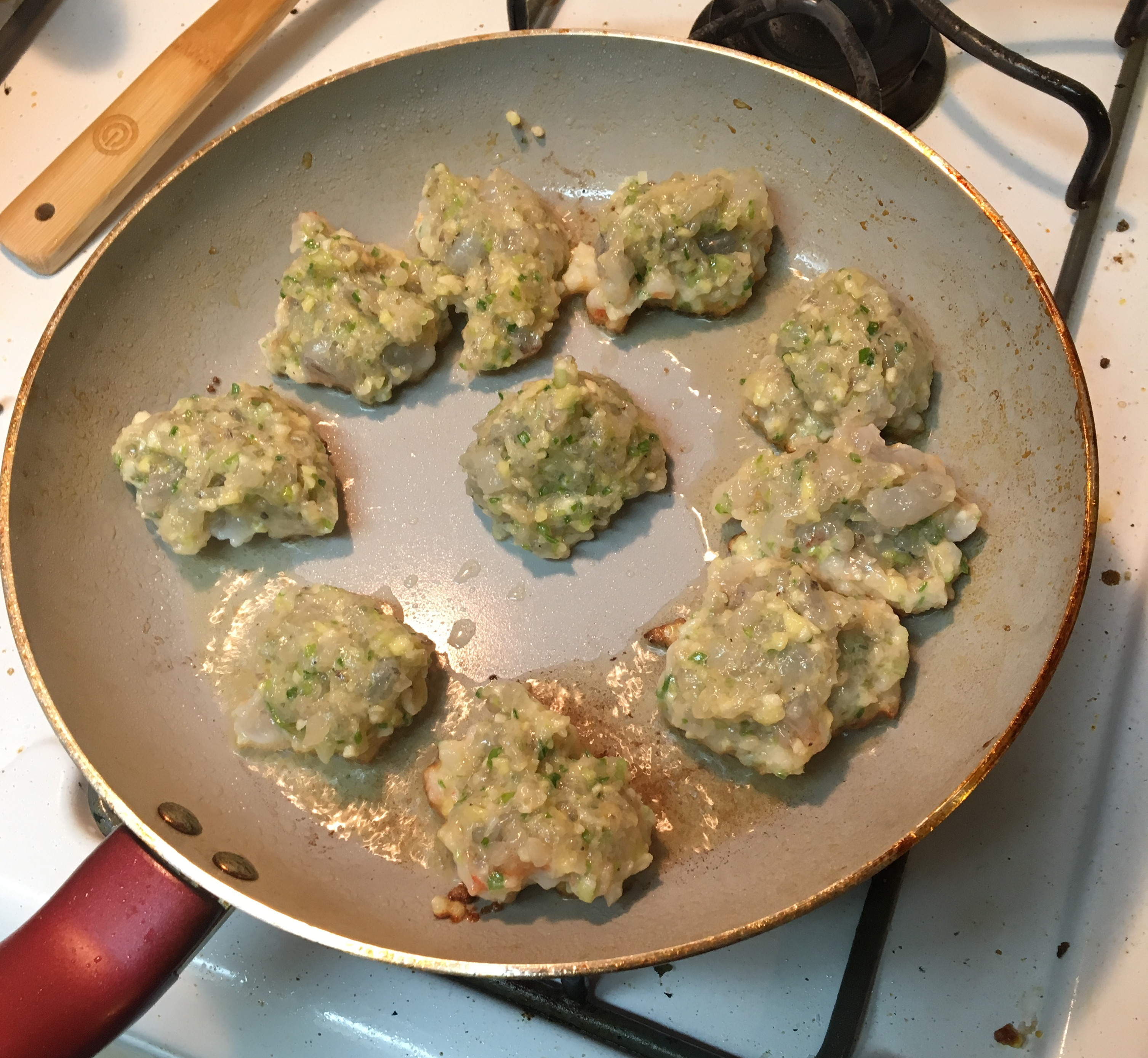 A pan of cooking dumpling paste