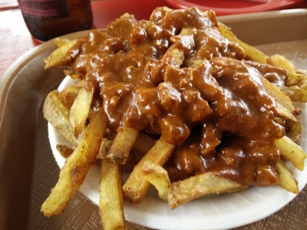 A plate of chili cheese fries. 