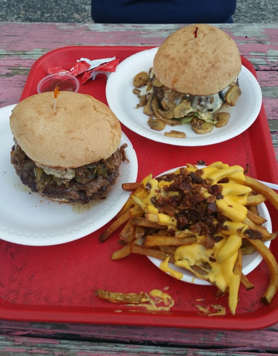 Chili cheese fries, and two hamburgers